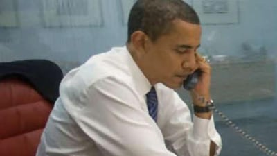 The US president-elect Barack Obama takes phone calls from world leaders.