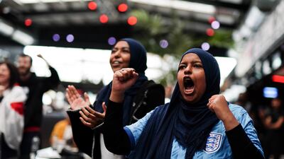 England fans celebrate as their side wins on penalties. PA