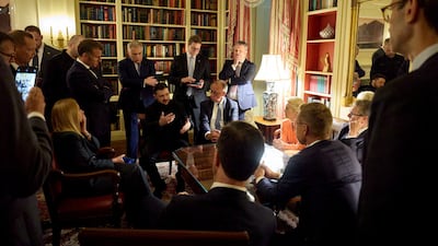 Ukrainian President Volodymyr Zelenskyy speaks with French President Emmanuel Macron, German Chancellor Friedrich Merz, Britain's Prime Minister Keir Starmer, European Commission's President Ursula von der Leyen, Italian Prime Minister Georgia Meloni, Finland's President Alexander Stubb and Nato's Secretary General Mark Rutte, at the White House Library, in Washington, on August 18. Reuters