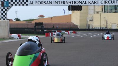 Student teams compete in the qualifying races of the Global Hybrid Electric Car Challenge in Abu Dhabi on Thursday. Ravindranath K / The National