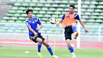 Mohanad Salem (right) in action during a training session in Kuala Lumpur. Courtesy: UAE FA / June 15, 2015