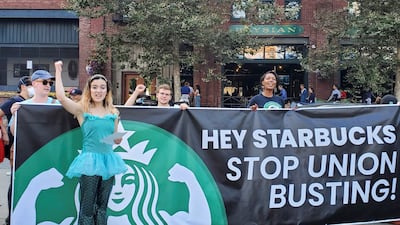 Starbucks employees who support unionisation protest in the company's hometown in Seattle, US on September 12. In 2008, the coffee company had to shut 70 per cent of its outlets in Australia, having misread the Australian market. Reuters