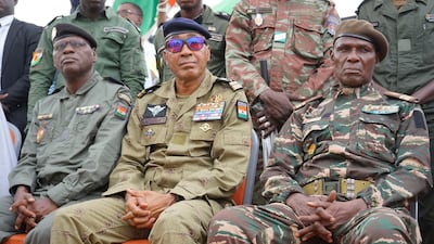 Members of Niger's military-run government, from left, Assahaba Ebankawel, Col Sidi Mohamed and Col Ibroh Amadou Bacharou. EPA