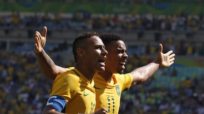 Neymar, left, and Gabriel Jesus, right, both scored twice during the 6-0 victory against Honduras. Javier Etxezarreta / EPA