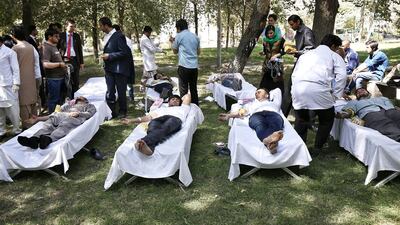 Afghans donate blood for those injured in Kunduz fighting, in Kabul, Afghanistan on October 5 2015. Nato on Monday said that American soldiers had never been under threat and that it had launched attacks in response to a request by Afghan forces. Hedayatullah Amid/EPA