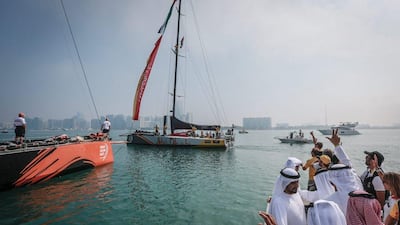 Fans wave farewell to Abu Dhabi Ocean Racing, far, and Team Alvimedica, left, as they leave port on Saturday for the start of Leg 3 to the Volvo Ocean Race, from Abu Dhabi to Sanya, China. Warren Little / Volvo Ocean Race / Getty Images