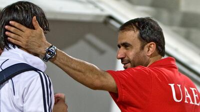 UAE manager Ali Ibrahim, right, is expecting a lot from his senior players at the Asian Games. Amy Leang / The National