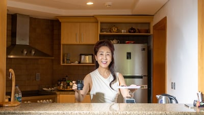 Jin Soo-young serves up coffee in the kitchen.