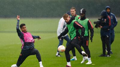 Emile Smith Rowe and Reuell Walters during training. Reuters