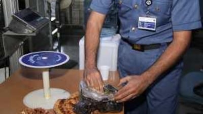 Customs officers at Dubai's Cargo Villagefound 11.5kg of raw opium hidden in spools of fabric that were being sent by air freight to Europe.