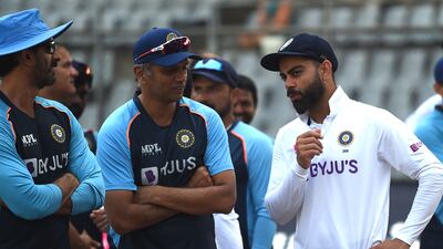 Virat Kohli with coach Rahul Dravid at the Wankhede Stadium in Mumbai last year. AFP