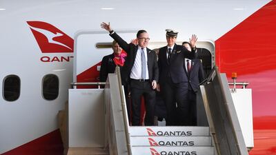 Qantas CEO Alan Joyce, left, and crew members of flight QF7879 disembark in Sydney, Australia after successfully flying direct from London to Sydney in 19-and-a-half hours. EPA