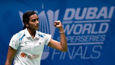 PV Sindhu celebrates after winning against Carolina Marin in their final group match on Friday in Dubai. Stringer / AFP / December 16, 2016