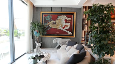The drawing room in Raza Beig's Palm Jumeirah villa in Dubai. Pawan Singh / The National