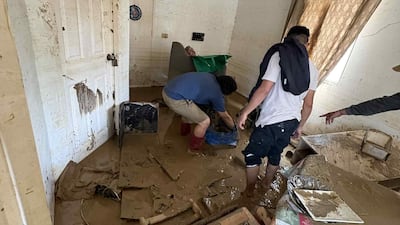 The search for belongings begins a day after the super typhoon claimed at least four lives and caused widespread damage