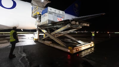 The stall is lifted up to be loaded on board.