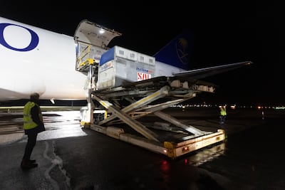 Mobile jet stalls are loaded on to the plane. Mark Chilvers / The National