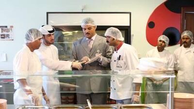 Inspectors from the Abu Dhabi Food Control Authority inspect the school cafeteria of the Emirates National School as part of an ongoing campaign.