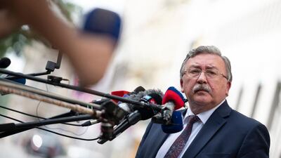 Russia's governor to the International Atomic Energy Agency, Mikhail Ulyanov, updates journalists outside the Grand Hotel Wien after a round of closed-door nuclear talks in Vienna. AFP