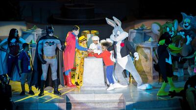 Sheikh Zayed bin Hamed (L), Sheikh Saif bin Hamed (C) and Sheikh Ahmed bin Hamed (R), push the button to signal the start of operations at Warner Bros. World Abu Dhabi. Eissa Al Hammadi / Crown Prince Court - Abu Dhabi