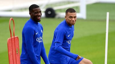 Nordi Mukele with Kylian Mbappe at PSG's training ground in Saint-Germain-en-Laye. AFP
