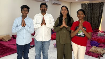 Dhiraj Jain, his wife Mamta and their children Jainam and Jivika in their Ajman home that they opened up to hundreds of stranded tourists.
