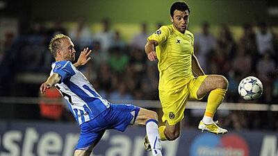 Giuseppe Rossi, right, shoots and scores to put Villarreal on their way to the Champions League group stages at the expense of Danish side Odense.