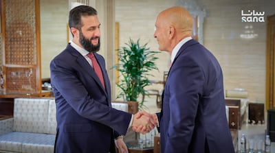 Syrian President Ahmad Al Shara met US envoy Tom Barrack in Damascus on Monday. Photo: Sana