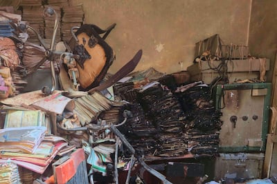 The burnt interior of the Agricultural Bank of Sudan after a reported RSF attack in Al Obeid. AFP