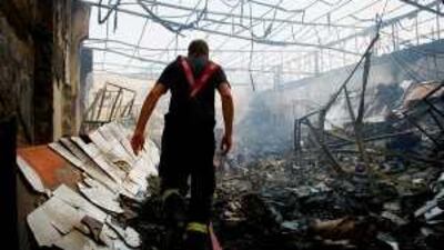 Fire destroyed shops and warehouses in Sharjah's Industrial Area 3 yesterday.