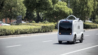 A Neolix hits the road during a test drive at the company's facility in Changzhou, Jiangsu province, China. Bloomberg