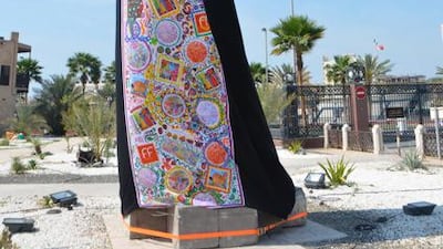 The largest abaya, 10 metres, the width at the bottom 4.02 and top with sleeves 5.47cm, students at Mawaheb from Beautiful People, an art centre for adults with special needs at Sikka Fair. Courtesy: Mawaheb