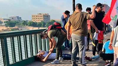 Protesters were injured by tear gas fired by security forces. AP Photo