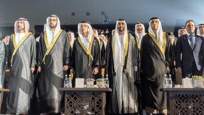 Left to right: Sheikh Ammar bin Humaid Al Nuaimi, Crown Prince of Ajman, Sheikh Rashid bin Saud bin Rashid Al Mu'alla, Crown Prince of Umm Al Quwain, Sheikh Hazza bin Zayed, Vice Chairman of the Abu Dhabi Executive Council, Sheikh Nahyan Bin Zayed, Chairman of the Board of Trustees of Zayed bin Sultan Al Nahyan Charitable and Humanitarian Foundation and Sheikh Mansour bin Zayed, UAE Deputy Prime Minister and Minister of Presidential Affairs, stand for the National Anthem during the 46th UAE National Day celebrations at Mushrif Palace. Rashed Al Mansoori / Crown Prince Court - Abu Dhabi
