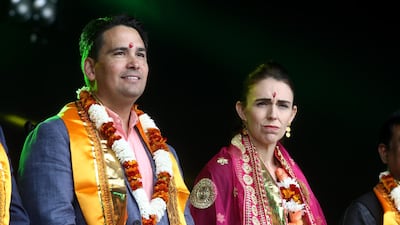 Opposing politicians: New Zealand Prime Minister Jacinda Ardern (R) and National Party leader Simon Bridges pictured on stage during the 18th Auckland Diwali Festival on October 12, 2019 in Auckland, New Zealand. Photo: Phil Walter / Getty Images