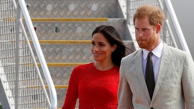Britain's Prince Harry and Meghan, Duchess of Sussex, arrive at Fua'amotu airport on the main island Tongatapu in Tonga. REUTERS