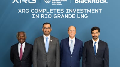 Dr Sultan Al Jaber, Minister of Industry and Advanced Technology, managing director and group chief executive of Adnoc and executive chairman of XRG, with Adebayo Ogunlesi, chairman of Global Infrastructure Partners, BlackRock chief executive Larry Fink and Mohamed Al Aryani, president of XRG International Gas. Photo: XRG