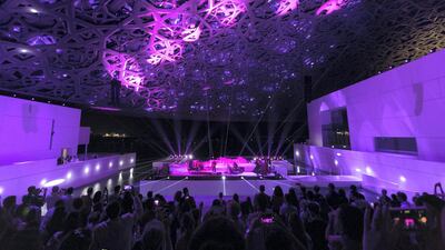11. LOUVRE ABU DHABI: French artist M performs under the magnificent canopy of the Louvre Abu Dhabi, Saadiyat Island, on opening day in November 2017. Christopher Pike / The National