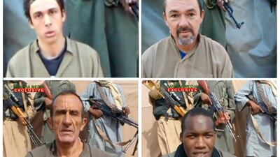 Four of six French hostages held by Al Qaeda in the Islamic Maghreb (AQIM) since September 2010, (LtoR) Pierre Legrand, Marc Feret, Daniel Larribe and Thierry Dole. Sahara Media via AFP