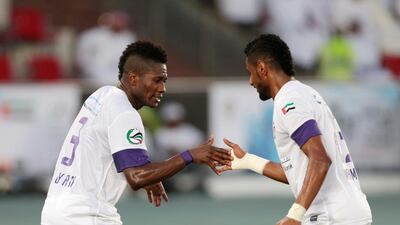 Asamoah Gyan celebrates a goal during the President's Cup final with Al Ain teammate Mohamed Ahmad o May 18, 2014. Christopher Pike / The National
