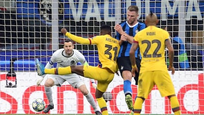 Ansu Fati (C) scores the dramatic winner. EPA