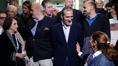 The former prisoners first flew in a Qatari government aircraft from Iran to Doha before continuing to the US. AP