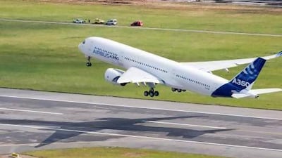 The Airbus A350 takes off on its maiden flight at Blagnac airport near Toulouse, southwestern France. Sylvain Ramadier / AP Photo
