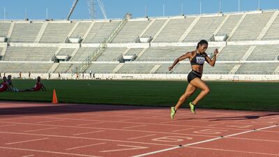 Aziza Sbaity crosses the finishing line at Camille Chamoun Sports City Stadium. Courtesy Matt Kynaston