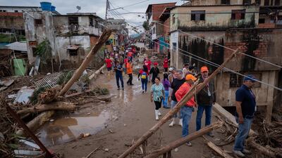 Five small rivers in central Venezuela flooded due to the heavy rains, leaving at least 25 people dead and 52 missing. EPA