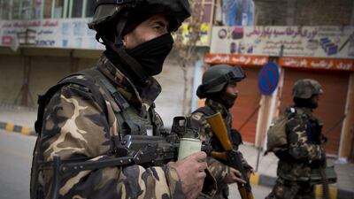 Afghan National Security Forces members arrive after the attack.