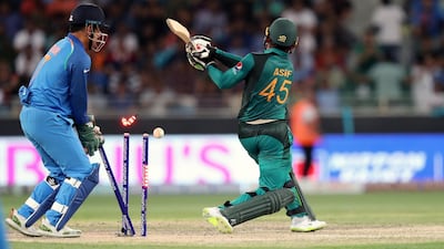 Pakistan's Asif Ali is bowled by India's Yuzvendra Chahal during the game between India and Pakistan in the Asia cup at Sports City, Dubai. Photos by Chris Whiteoak / The National
