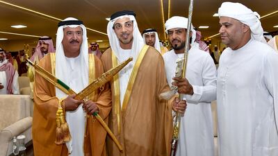 Sheikh Mansour bin Zayed, UAE Deputy Prime Minister and Minister of Presidential Affairs, presents an award to the winners of the Saudi Crown Prince Camel Festival, at Taif. Seen with Sheikh Sultan bin Hamdan. Hassan Al Menhali for the Ministry of Presidential Affairs