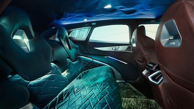 The roof lining has geometric contours, rather than being a predominantly flat surface.