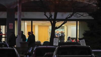 Chicago police officers investigate the scene of a shooting that took place at Mercy Hospital and Medical Center in Chicago, Illinois. EPA
